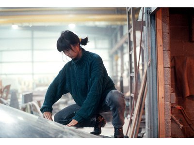 The 1989 photograph, Maya Lin working on Civil Rights Memorial by Adam Stoltman, is among numerous works including 3D models, sketchbooks, personal papers and family photos in the exhibition, &quot;One Life: Maya Lin,&quot; at the Smithsonian&#39;s National Portrait Gallery.&nbsp;